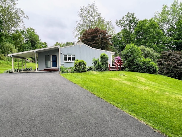 25 Old Middle Rd, Brookfield, CT 06804 - view of front of property with a front lawn, asphalt driveway, and a carport