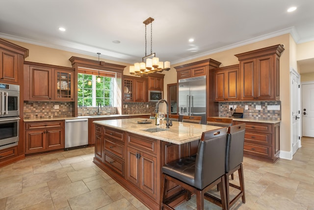 162 Balfour Dr, West Hartford, CT 06117 - kitchen featuring a sink, built in appliances, an island with sink, backsplash, and glass insert cabinets
