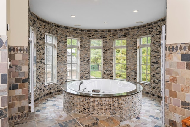 162 Balfour Dr, West Hartford, CT 06117 - full bath featuring tile walls, healthy amount of natural light, a garden tub, recessed lighting, and stone tile floors
