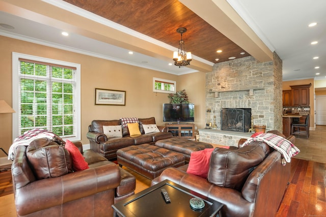 162 Balfour Dr, West Hartford, CT 06117 - living room featuring crown molding, recessed lighting, a stone fireplace, and wood finished floors