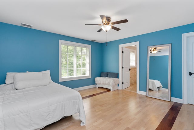 162 Balfour Dr, West Hartford, CT 06117 - bedroom with multiple windows, wood finished floors, baseboards, and a ceiling fan