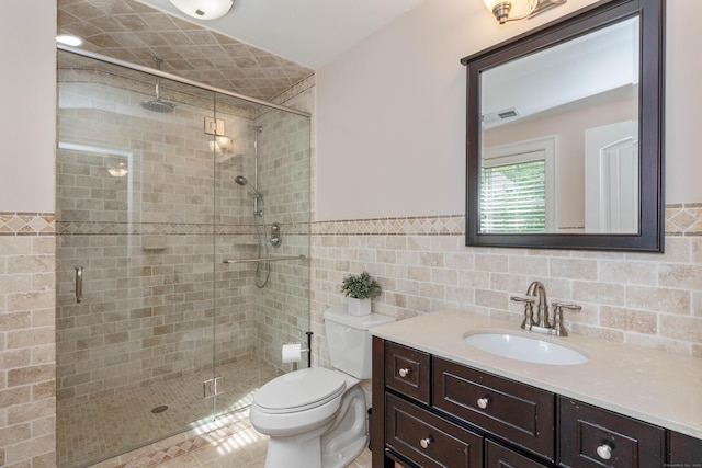 162 Balfour Dr, West Hartford, CT 06117 - full bath featuring tile walls, a stall shower, vanity, toilet, and a wainscoted wall
