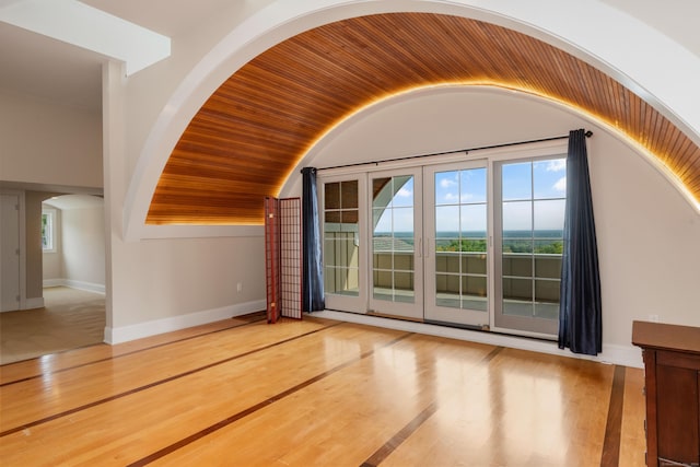 162 Balfour Dr, West Hartford, CT 06117 - additional living space featuring wood finished floors, baseboards, and vaulted ceiling