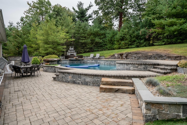 162 Balfour Dr, West Hartford, CT 06117 - outdoor pool with an outdoor stone fireplace and a patio area