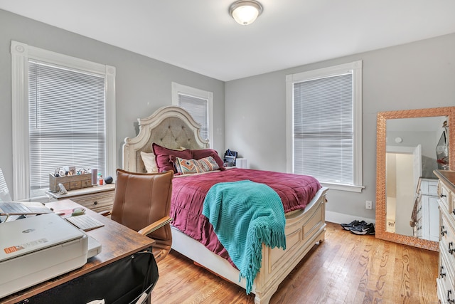 bedroom featuring light wood-type flooring