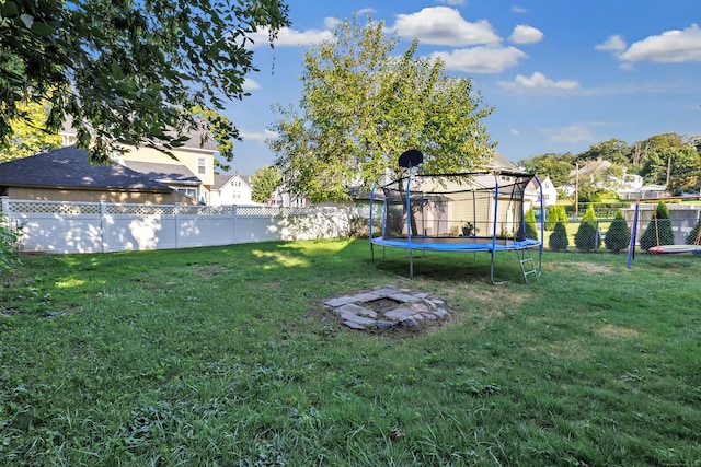 view of yard with a trampoline