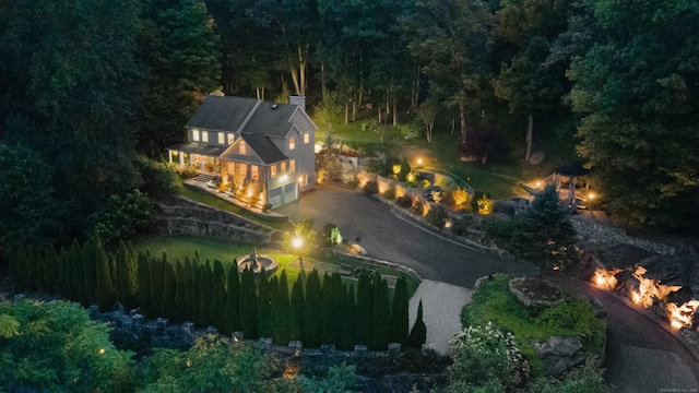 aerial view featuring a view of trees