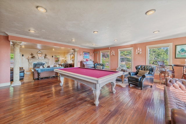 recreation room with hardwood / wood-style flooring, billiards, decorative columns, and ornamental molding