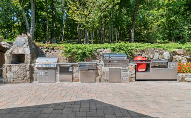 view of patio / terrace with area for grilling and an outdoor kitchen