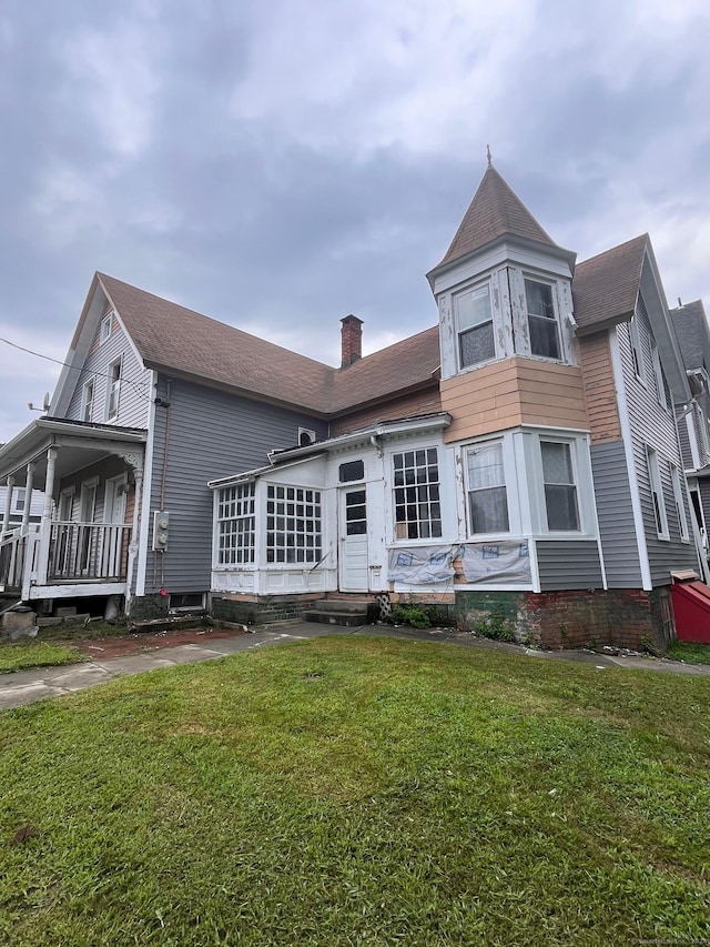 exterior space with a front yard