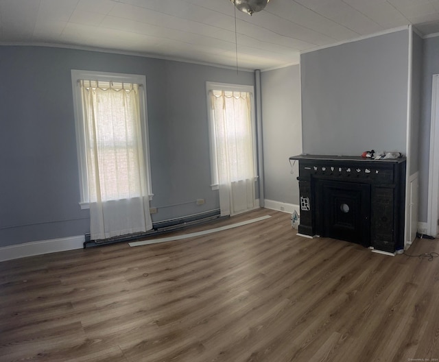 interior space featuring crown molding and dark wood-type flooring