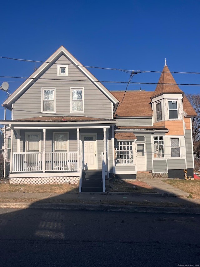 victorian home featuring covered porch