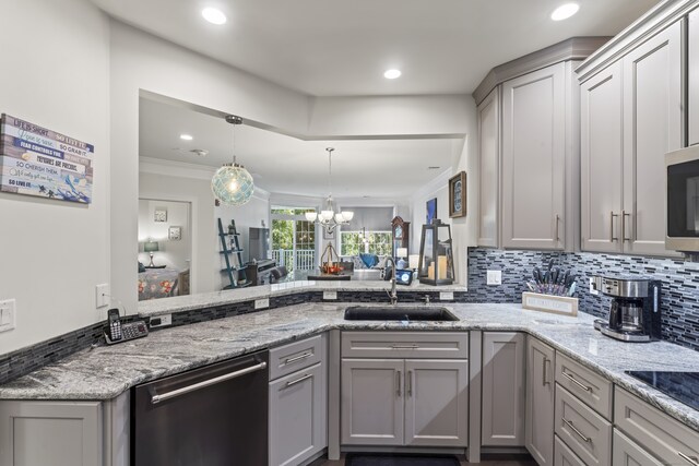 kitchen with gray cabinetry, a chandelier, crown molding, and stainless steel dishwasher