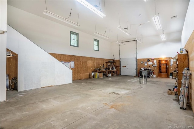 garage with wood walls