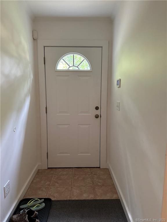 doorway featuring light tile patterned floors