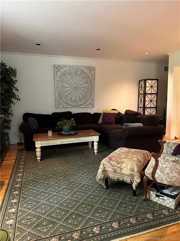 living room with hardwood / wood-style flooring