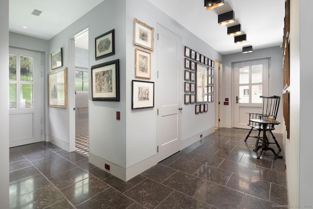 89 Under Mountain Rd, Canaan, CT 06031 - hallway with healthy amount of natural light, granite floors, and recessed lighting
