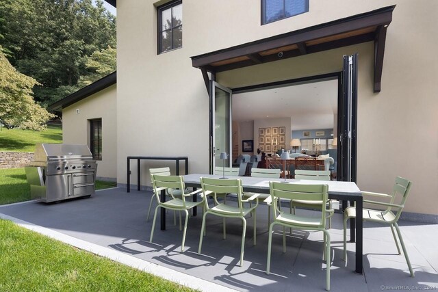 89 Under Mountain Rd, Canaan, CT 06031 - view of patio featuring outdoor dining space and area for grilling