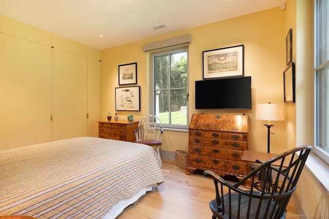 bedroom featuring light hardwood / wood-style flooring