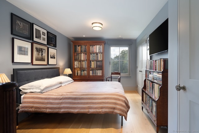 bedroom with light wood-type flooring