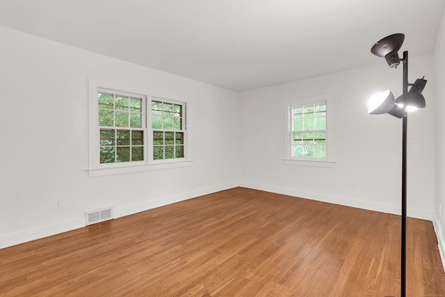 empty room featuring hardwood / wood-style floors