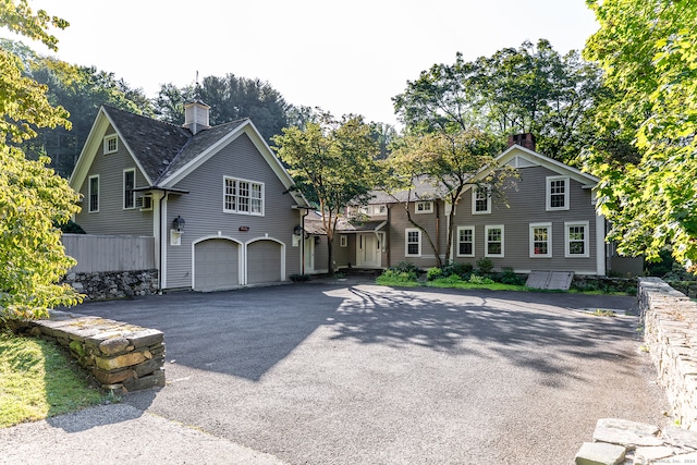 front of property featuring a garage