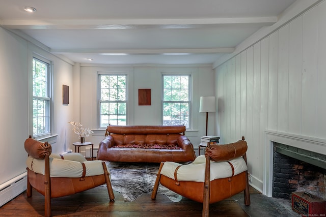 living area with beamed ceiling, dark wood-type flooring, and a baseboard radiator