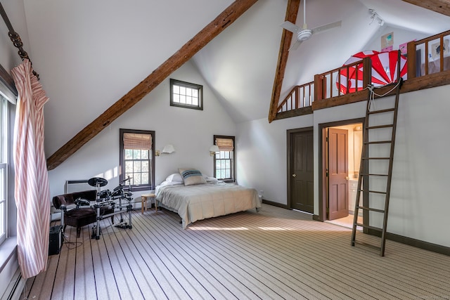 bedroom featuring beam ceiling, high vaulted ceiling, baseboard heating, and ceiling fan