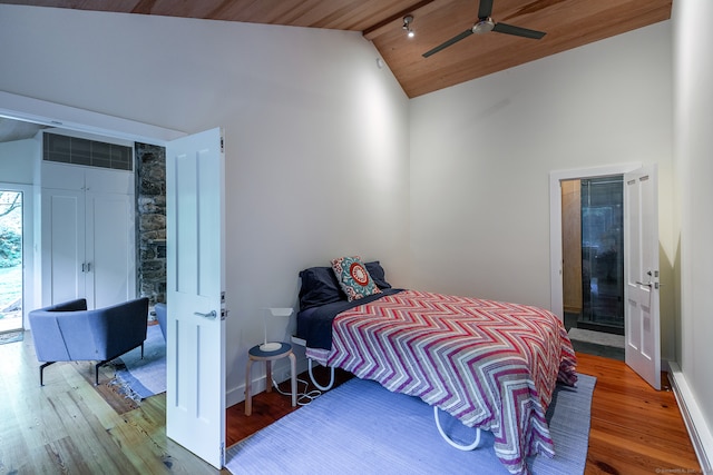 bedroom featuring ceiling fan, hardwood / wood-style flooring, wooden ceiling, and high vaulted ceiling