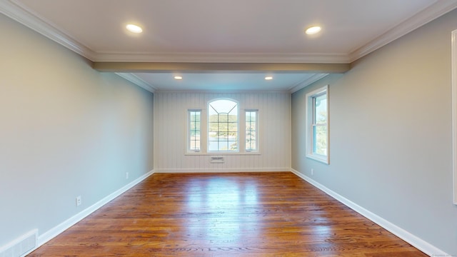 unfurnished room with dark hardwood / wood-style flooring and ornamental molding