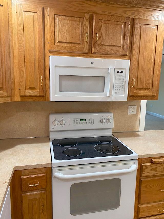 kitchen featuring white appliances