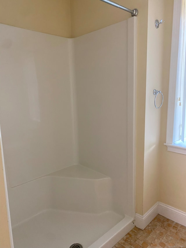 bathroom with walk in shower