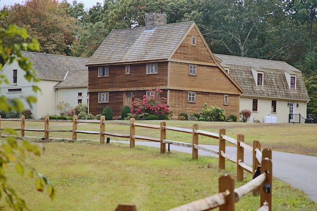 view of front of home with a front yard