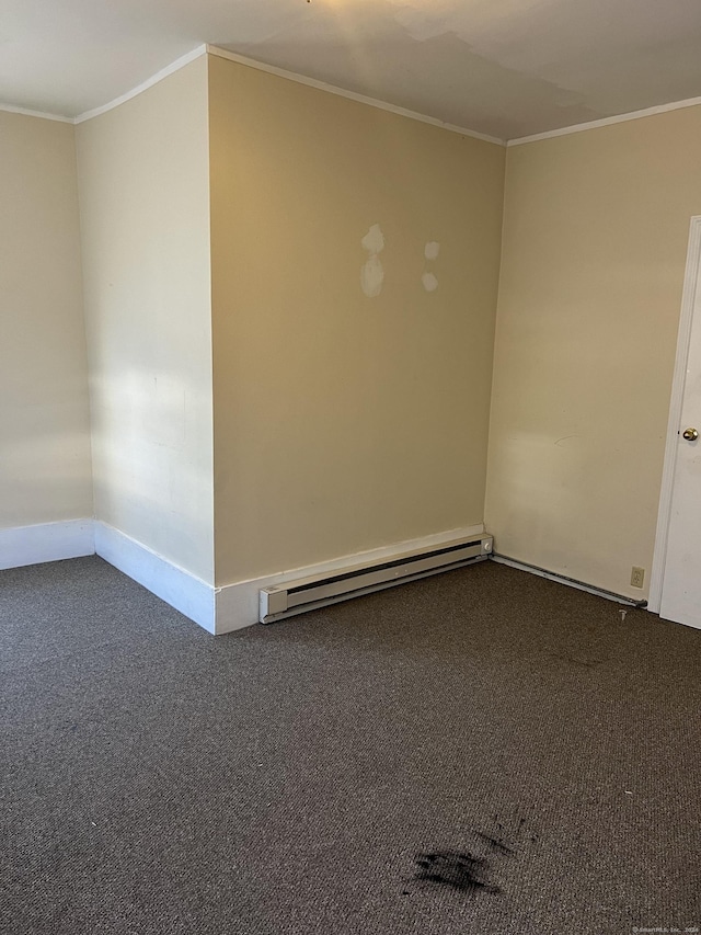 carpeted empty room featuring baseboards, baseboard heating, and ornamental molding