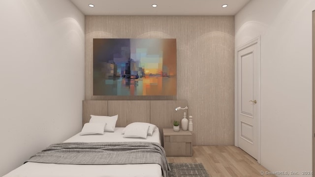 bedroom with light hardwood / wood-style floors