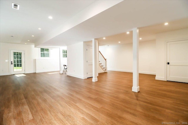 basement featuring light wood-type flooring