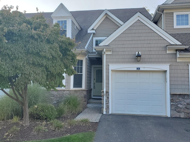 view of front of property featuring a garage