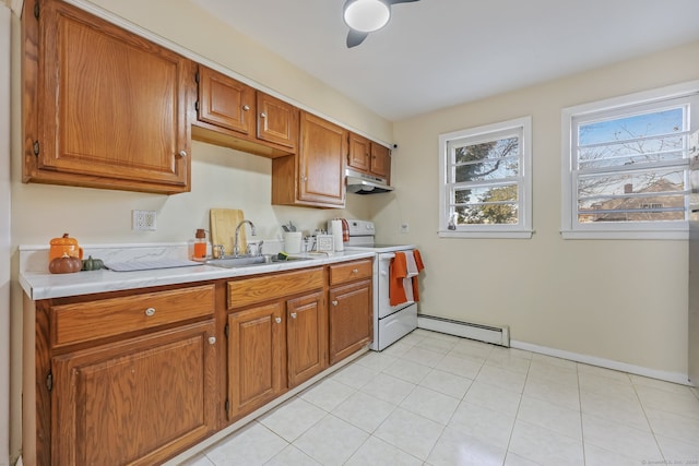 kitchen with ceiling fan, a baseboard heating unit, sink, light tile patterned floors, and electric range