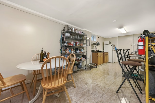 view of tiled dining space