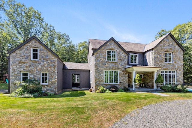 view of front of house with a front lawn