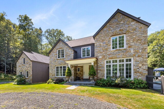 view of front of house with a front lawn