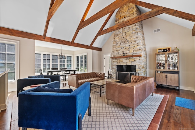 living room featuring a fireplace, beam ceiling, dark wood-type flooring, and high vaulted ceiling