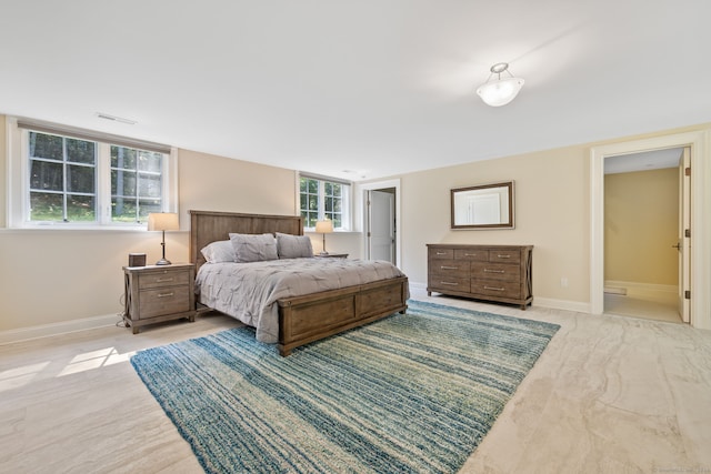 bedroom with ensuite bath