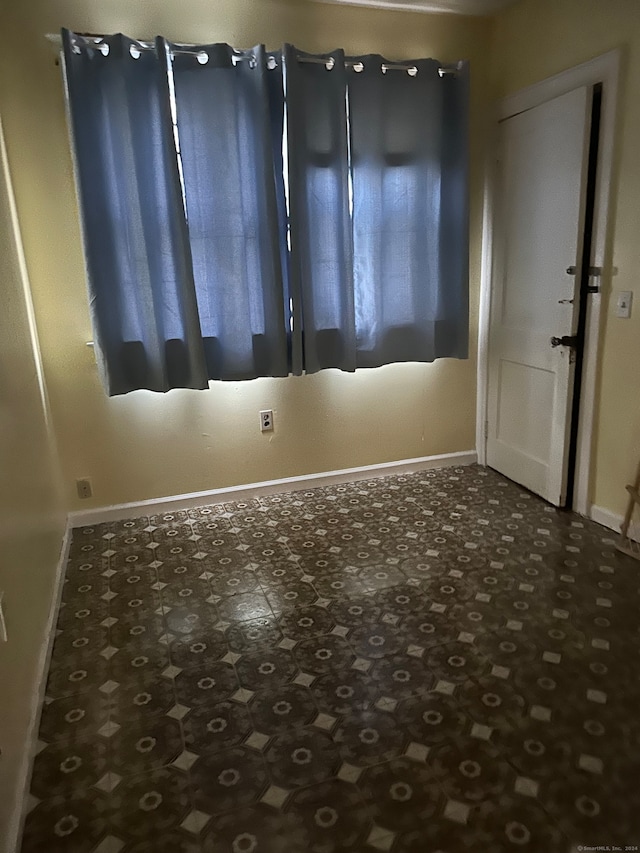 spare room featuring a wealth of natural light