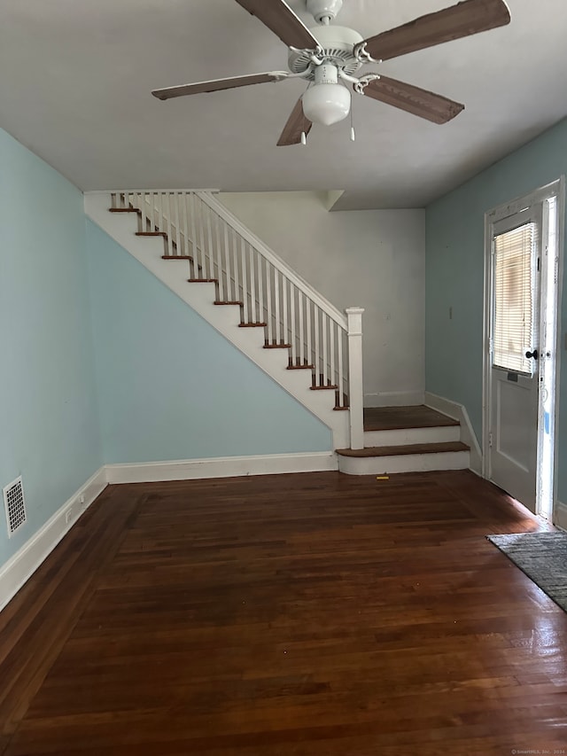 entrance foyer with ceiling fan and dark hardwood / wood-style flooring