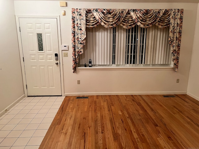 foyer with light hardwood / wood-style flooring