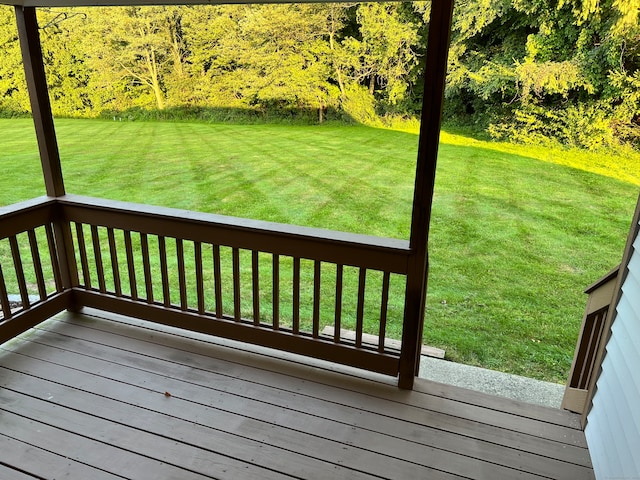 deck featuring a lawn