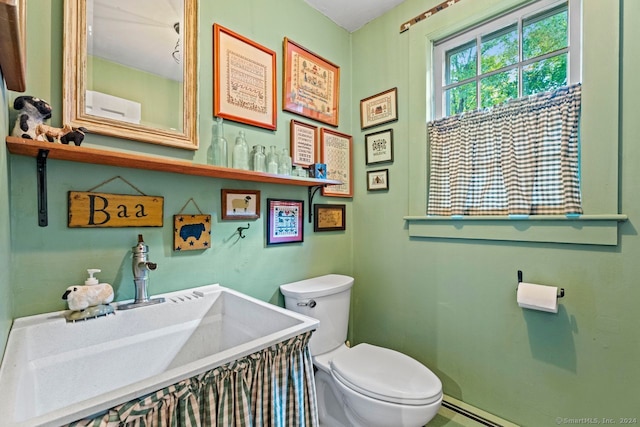 bathroom with sink and toilet