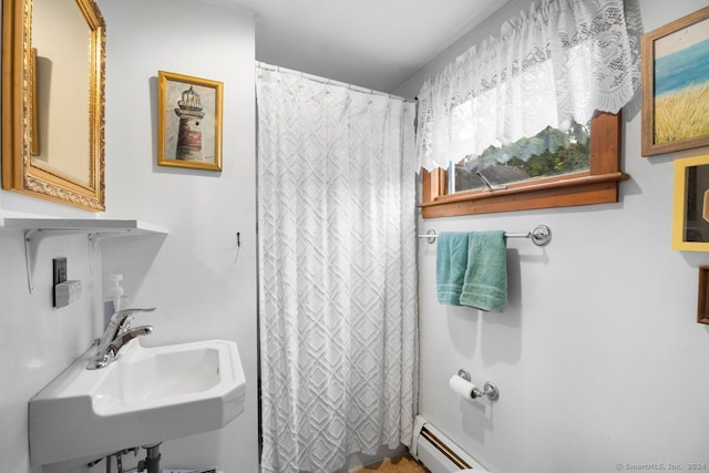 bathroom with sink and curtained shower