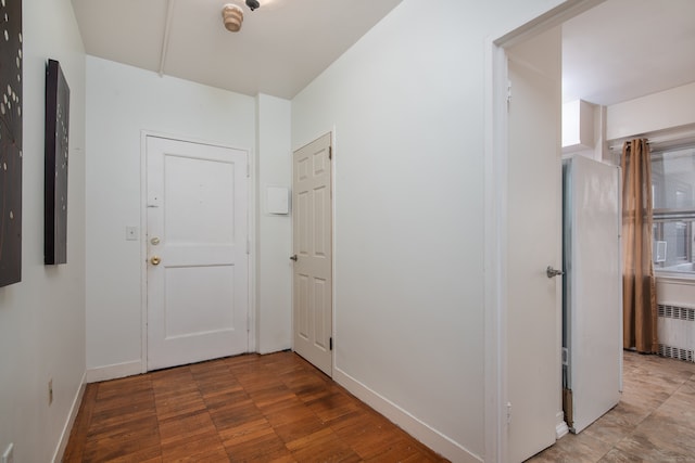 hallway featuring radiator heating unit